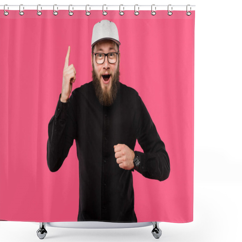 Personality  excited bearded man in eyeglasses and cap hat doing idea gesture isolated on pink shower curtains