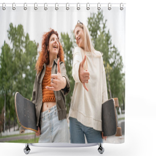 Personality  Low Angle View Of Blurred Skaters Showing Shaka Gesture While Smiling At Each Other Shower Curtains