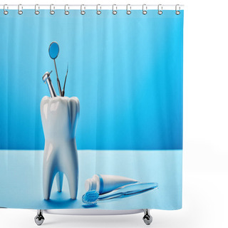 Personality  Close Up View Of White Tooth Model, Toothbrush, Toothpaste And Stainless Dental Instruments On Blue Backdrop Shower Curtains