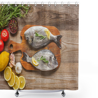 Personality  Top View Of Raw Fish On Wooden Board With Rosemary And Lemon On Table Shower Curtains