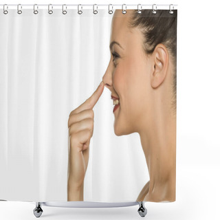 Personality  Young Happy Woman Touches Her Nose With Her Finger On A White Background Shower Curtains