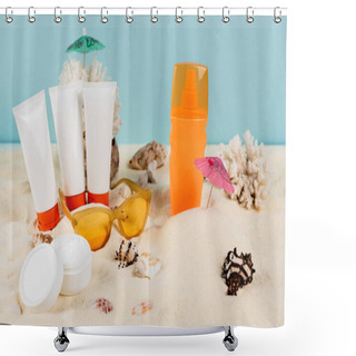 Personality  Cosmetic Cream, Sunblock Tubes, Seashells And Sunglasses On Sand Isolated On Blue Shower Curtains