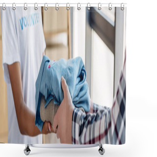Personality  Panoramic Shot Of African American Volunteer Giving Clothes To Man In Charity Center Shower Curtains