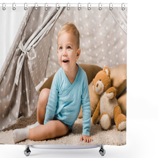Personality  Toddler Boy Sitting In Baby Wigwam With Pillow And Teddy Bear And Laughing Isolated On White Shower Curtains