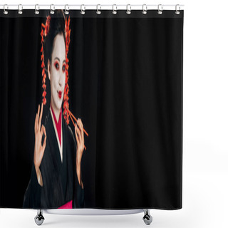Personality  Smiling Beautiful Geisha In Black Kimono With Red Flowers In Hair Holding Chopsticks And Showing Okay Sign Isolated On Black, Panoramic Shot Shower Curtains