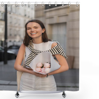 Personality  Joyful And Stylish Woman Holding Bouquet Of Flowers Wrapped In Paper While Standing On Street In Paris  Shower Curtains