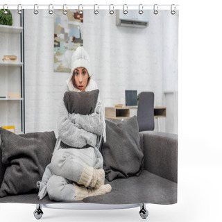 Personality  Freezed Young Woman In Warm Clothes Sitting On Couch And Hugging Cushion At Home Shower Curtains