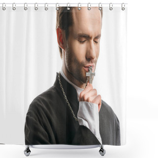 Personality  Young, Serious Catholic Priest Kissing Holy Cross With Closed Eyes Isolated On White Shower Curtains