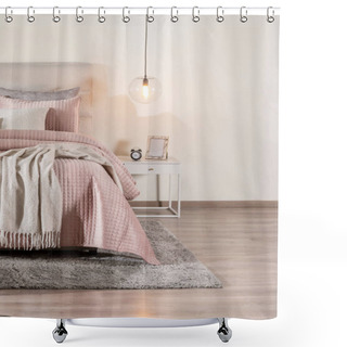 Personality  Serene Bedroom Essence Featuring Soft Pink Quilted Comforter On Cozy Bed, Draping Neutral-Toned Throw, Gray Rug Below, Modern Suspended Globe Light Illuminating White Nightstand, Warm Wooden Flooring. Shower Curtains
