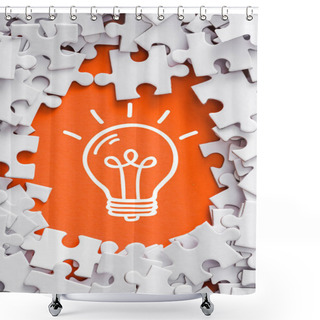 Personality  Top View Of Frame Of White Jigsaw Puzzle Pieces Around Of Light Bulb Lettering On Orange Shower Curtains