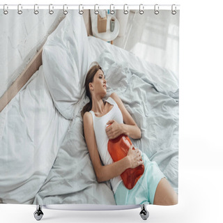 Personality  Overhead View Of Stressed Woman Lying On Bed With Warmer Shower Curtains