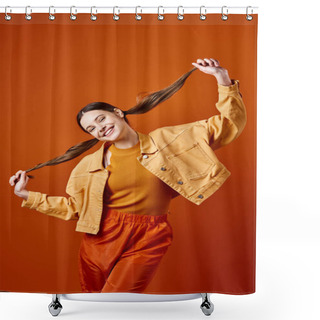 Personality  A Stylish Young Woman In Her 20s Wearing A Yellow Jacket And Pants, Posing Against An Orange Background In A Studio Setting. Shower Curtains