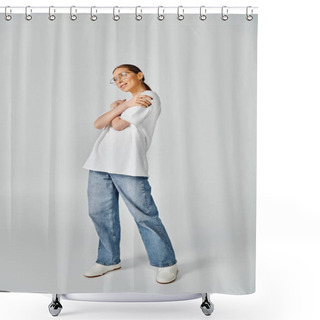 Personality  A Young Woman In A White T-shirt And Glasses Stands Confidently With Her Arms Crossed On A Grey Background. Shower Curtains