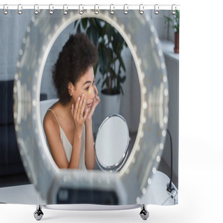 Personality  African American Woman Applying Eye Patches Near Mirror And Blurred Ring Light At Home  Shower Curtains