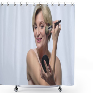 Personality  Smiling Middle Aged Woman Applying Face Powder Isolated On White Shower Curtains