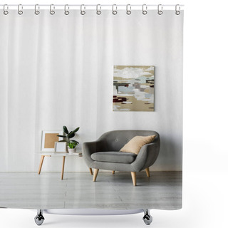 Personality  Grey Armchair Near Coffee Table With Frames And Green Plants Near Painting On Wall In Modern Living Room  Shower Curtains