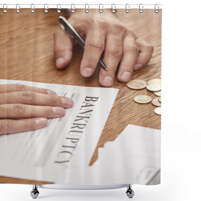 Personality  partial view of businessman filling in bankruptcy form at wooden table with coins shower curtains