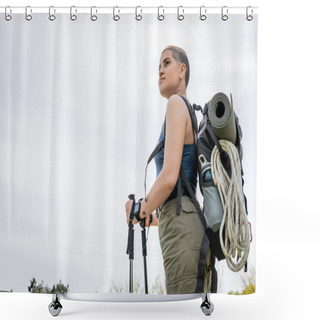 Personality  Low Angle View Of Young Short Haired Female Backpacker With Fitness Tracker And Backpack Looking Away While Holding Trekking Poles With Sky At Background, Solo Hiking Journey Concept  Shower Curtains