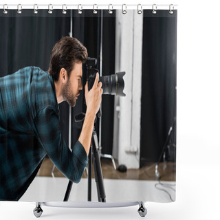 Personality  Side View Of Professional Young Photographer Working With Camera In Photo Studio Shower Curtains