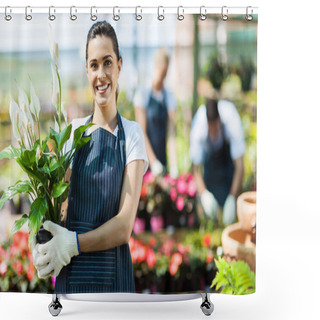 Personality  Happy Female Nursery Owner With Pot Of Flowers Inside Greenhouse Shower Curtains