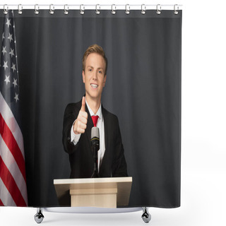Personality  Smiling Man Showing Thumb Up On Tribune With American Flag On Black Background Shower Curtains