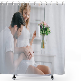 Personality  Smiling Pregnant Woman With Cup Of Tea Resting On Chair While Husband Touching Belly Near By At Home Shower Curtains