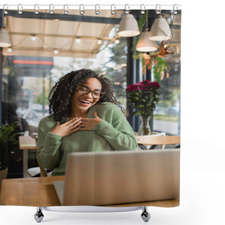 Personality  Flattered African American Woman In Glasses Looking At Laptop On Blurred Foreground  Shower Curtains