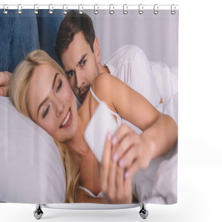 Personality  Suspicious Young Man Peeking At Smiling Wife Using Smartphone In Bed, Mistrust Concept  Shower Curtains
