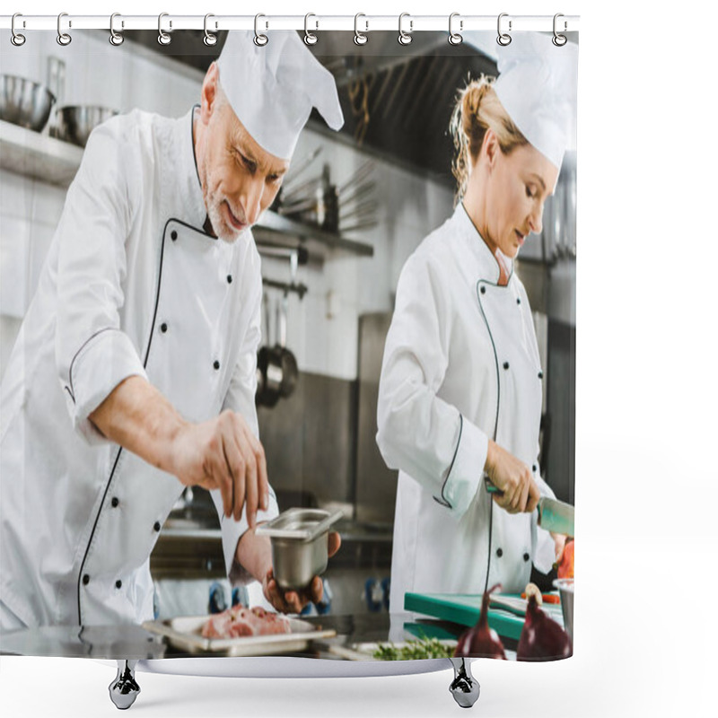 Personality  focused male and female chefs in uniform preparing food in restaurant kitchen shower curtains