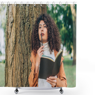 Personality  Selective Focus Of Dreamy Woman In Raincoat Holding Pen And Notebook Near Tree  Shower Curtains