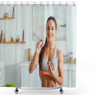 Personality  Happy Sportive Woman Holding Almond And Smiling At Home  Shower Curtains