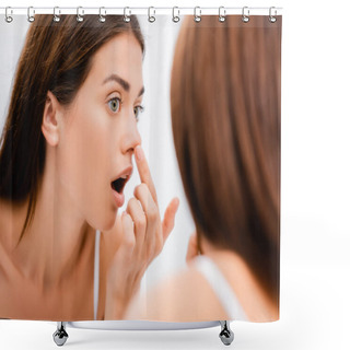 Personality  Shocked Young Woman Touching Nose While Looking In Mirror In Bathroom, Blurred Foreground Shower Curtains