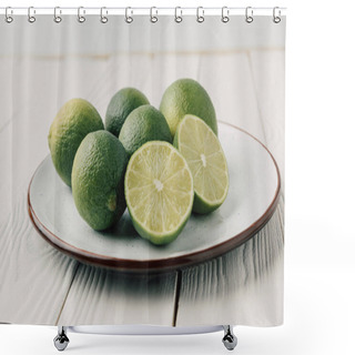 Personality  Green Limes On Plate On White Wooden Background Shower Curtains
