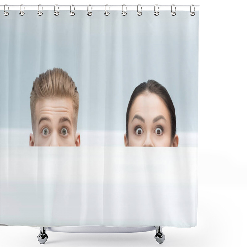 Personality  scientists hiding behind table shower curtains