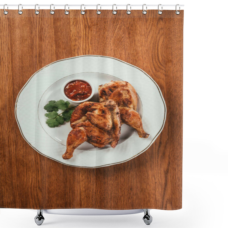 Personality  grilled chicken laying on plate with red sauce in saucer over wooden surface shower curtains