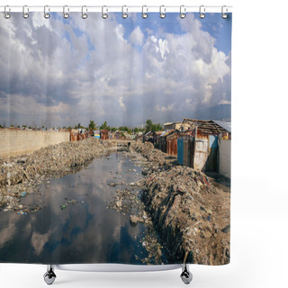 Personality  Cite Soleil, Haiti - March, 2017: Extremely Impoverished And Densely Populated Commune In Haiti, The Water In This Slum Is Really Polluted And Contaminated With Plastics And Garbage That Goes Directly To The Ocean, Unsanitary Conditions. Shower Curtains