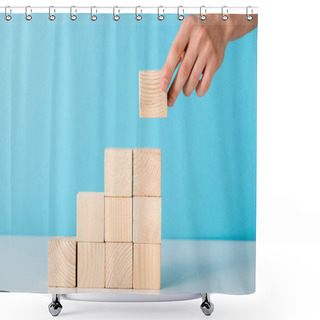 Personality  Cropped View Of Businessman Putting Wooden Cube On Blue  Shower Curtains