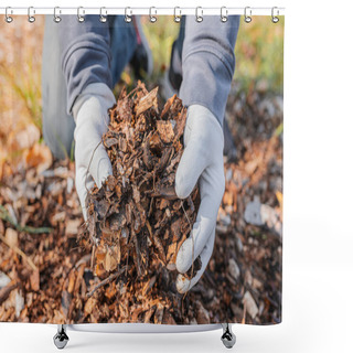 Personality  Man's Hands In Gardening Gloves Are Sorting Through The Chopped Wood Of Trees. Mulching Tree Trunk Circle With Wood Chips. Organic Matter Of Natural Origin Shower Curtains