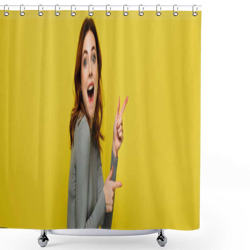 Personality  excited woman looking at camera while pointing with fingers isolated on yellow, banner shower curtains