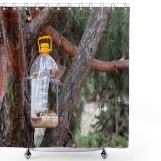 Personality  Homemade Manger Hanging On A Christmas Tree With Grain And Nuts In The Forest During The Day Shower Curtains