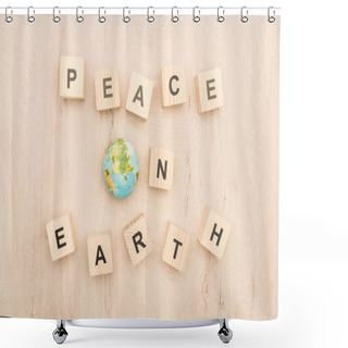 Personality  Top View Of Cubes With Peace On Earth Lettering And Toy Planet On Wooden Background  Shower Curtains