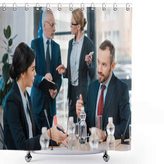 Personality  Selective Focus Of Diplomats Talking And Gesturing Near Glasses On Table  Shower Curtains