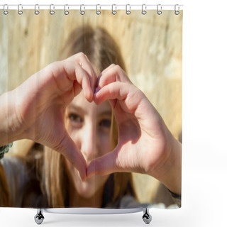 Personality  Teenage Girl With Long Hair Looks Through Folded Fingers In The Shape Of A Heart On A Sunny Day Shower Curtains