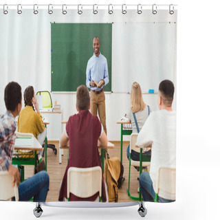 Personality  Rear View Of High School Teenage Students Listening African American Teacher With Book In Classroom  Shower Curtains