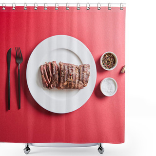 Personality  Top View Of Tasty Grilled Steak Served On Plate With Cutlery And Salt And Pepper In Bowls On Red Background Shower Curtains