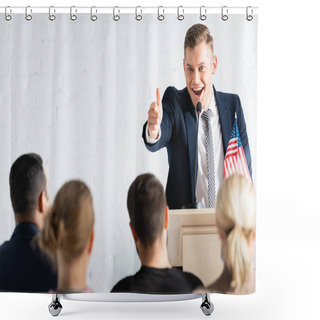 Personality  Excited Political Agitator Pointing With Finger At Electors In Conference Hall, Blurred Foreground Shower Curtains