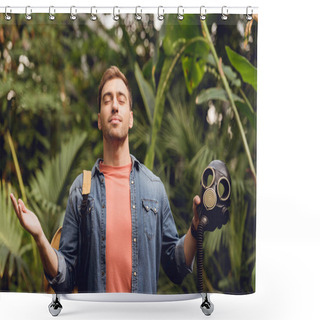 Personality  Smiling Traveler With Backpack And Closed Eyes Breathing Fresh Air While Holding Gas Mask In Tropical Forest Shower Curtains