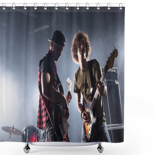 Personality  KYIV, UKRAINE - AUGUST 25, 2020: Musicians Playing Electric Guitars Near Drum Kit During Rock Band Rehearsal Shower Curtains