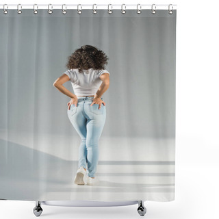Personality  Back View Of Woman Standing With Hands In Pockets In Tight Blue Jeans On Grey Background Shower Curtains