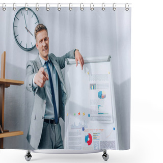 Personality  Cheerful Businessman Pointing At Camera While Standing Near Flipchart With Graphs  Shower Curtains